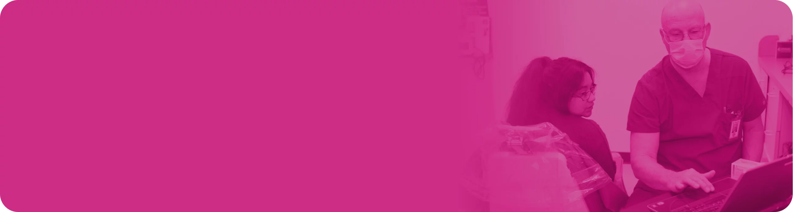 Two providers looking at a laptop.