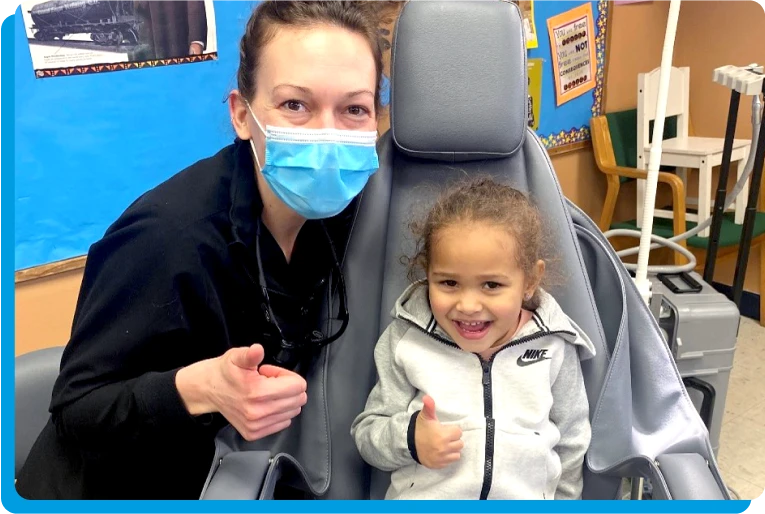 A Pediatric dentist with a patient